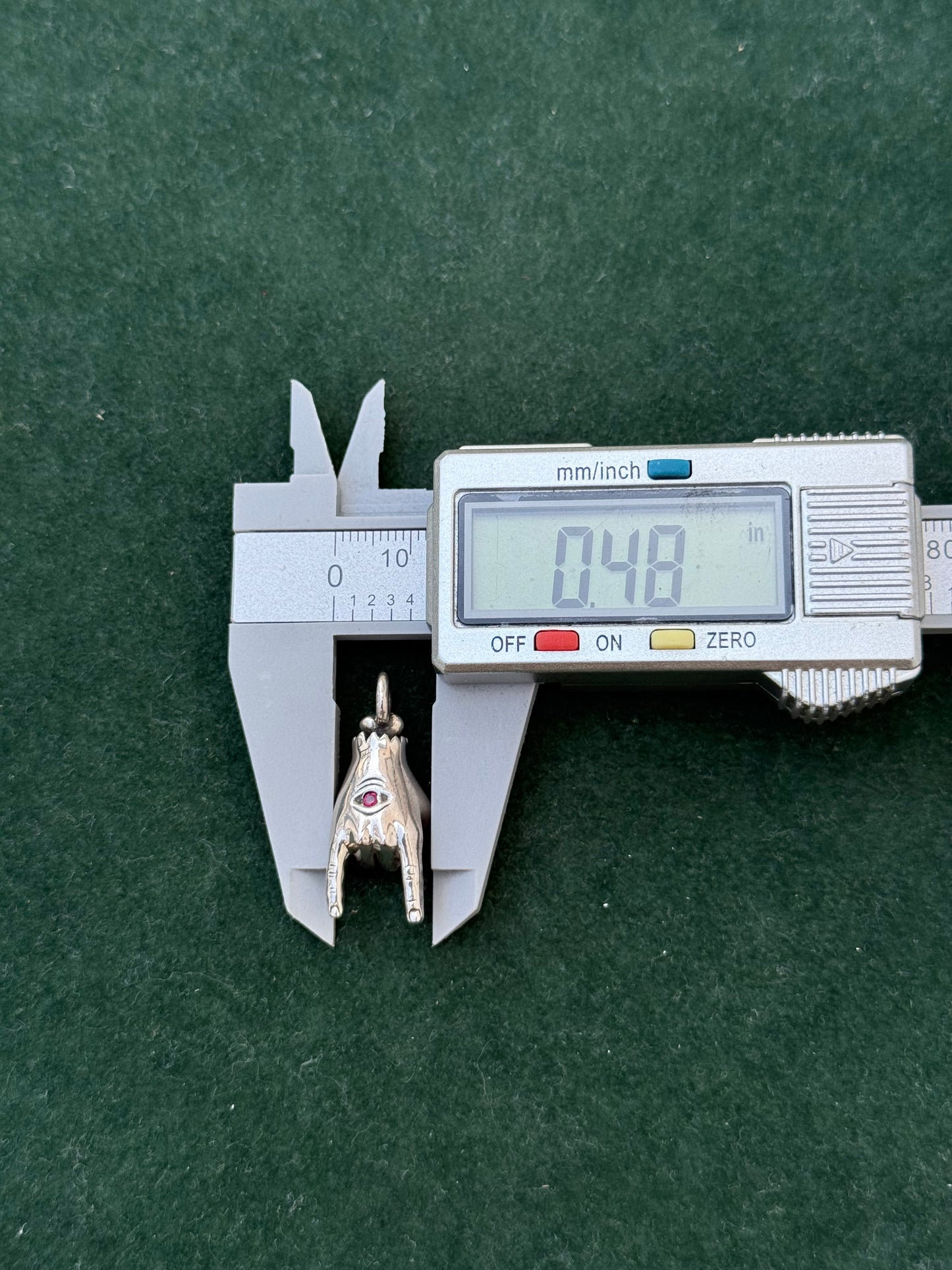 Sterling Silver “Devil Horns” Hand Pendant with Ruby Stone Eye