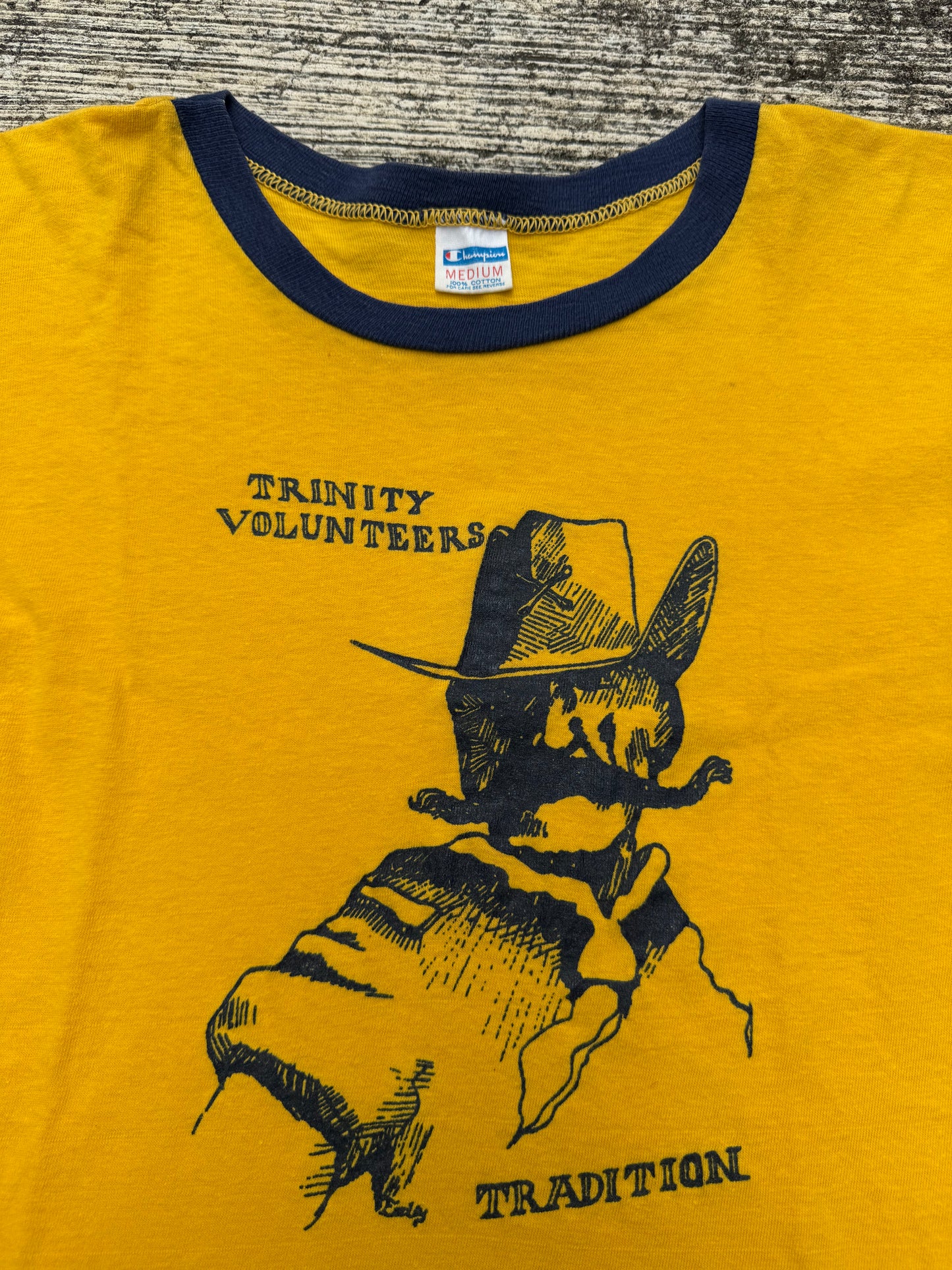 Vintage 1970s Champion Ringer T-Shirt Trinity Volunteers Tradition Cowboy Graphic